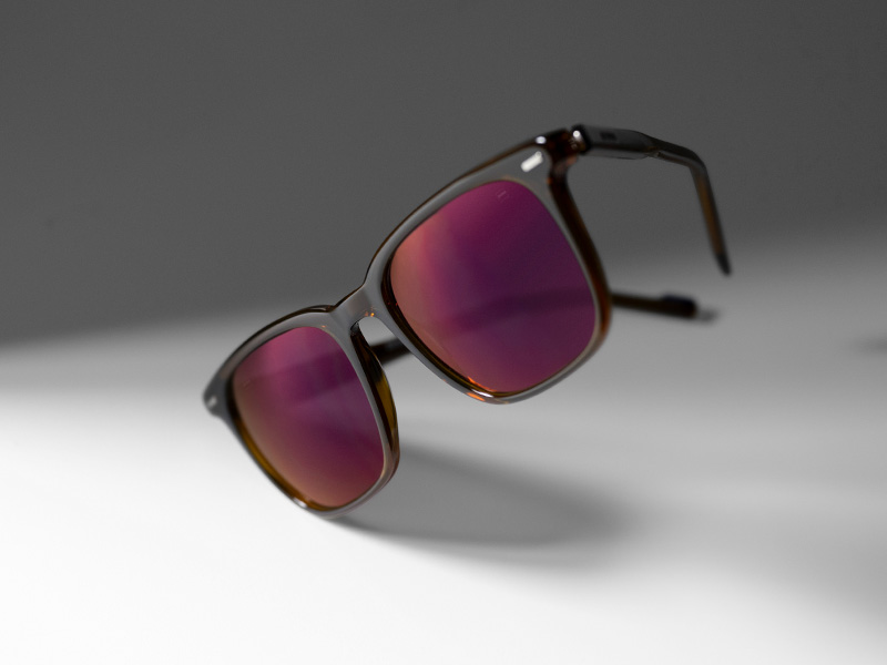 ZEISS DuraVision Gold UV overfladebehandling på farvede solglas i farven Burgundy
