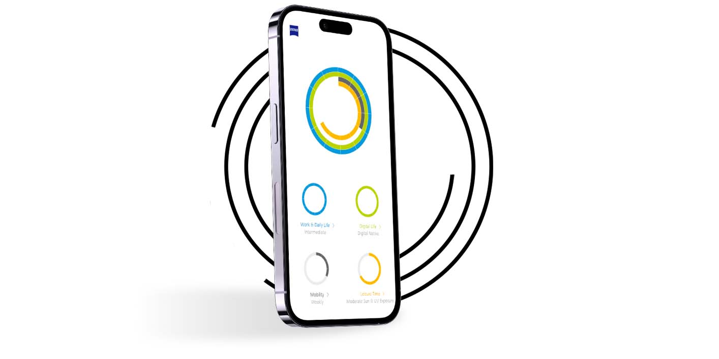 A smartphone in front of black rings shows the vision profile of a My Vision Profile    user with differently coloured rings.