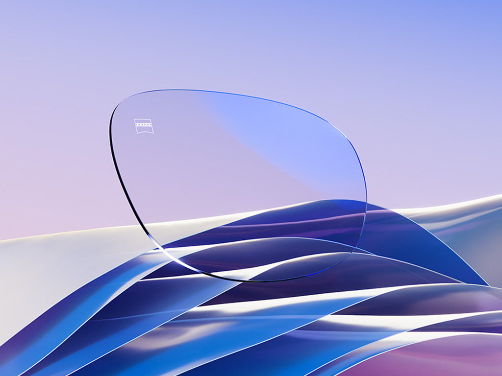 En CGI illustration af et klart brilleglas med en blød blå refleks.