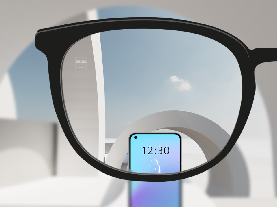 Skematisk illustration af punkt set gennem et SmartLife Young enkeltstyrkeglas, der viser et klart syn af fjerne genstande og digitale enheder. 
